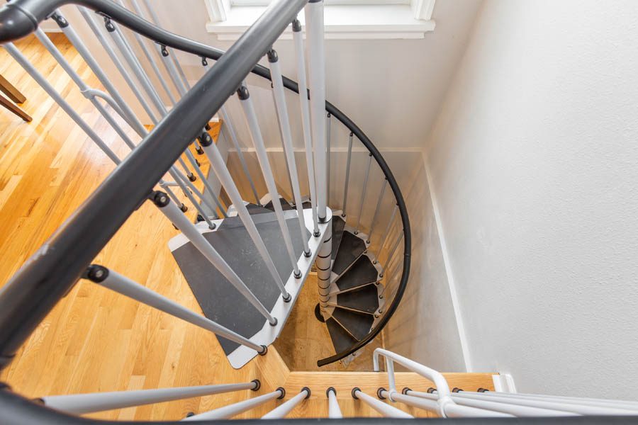 Looking down on a small spiral staircase