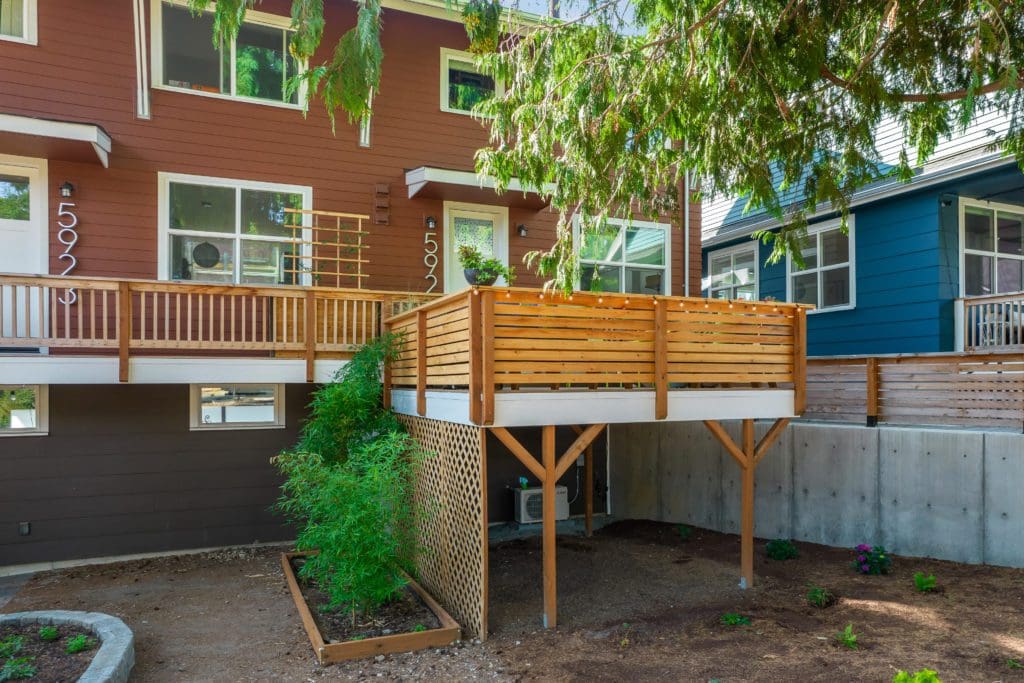 592342ndAvenueSouthwest_0008 Red house with a large raised deck