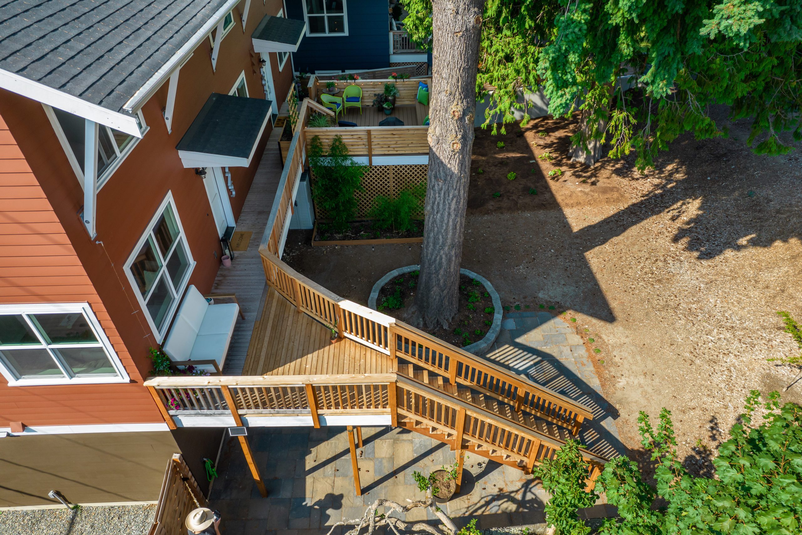 Aerial view of a custom built deck and large tree