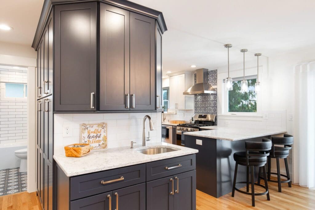 Haas ig 23 Kitchen remodel with gray custom cabinets and unique configuration
