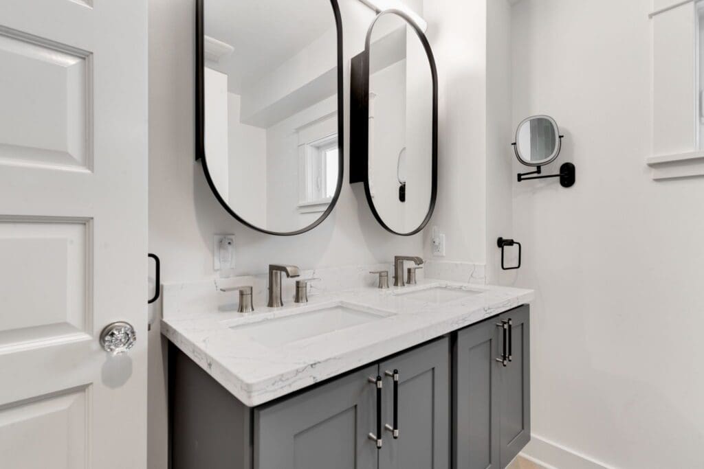 2577 8th Ave W, Seattle WA_0001 Double bathroom vanity with custom bathroom bathroom cabinets.