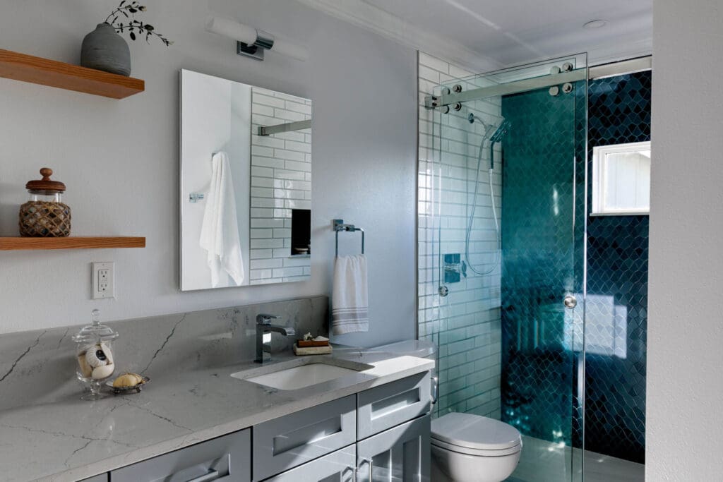 walk in shower, sliding shower barn door, gray bathroom